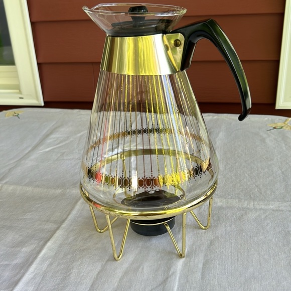 Vintage Pyrex carafe with lid 7” with 3” sterno stand all markings are in euc. - Picture 14 of 17